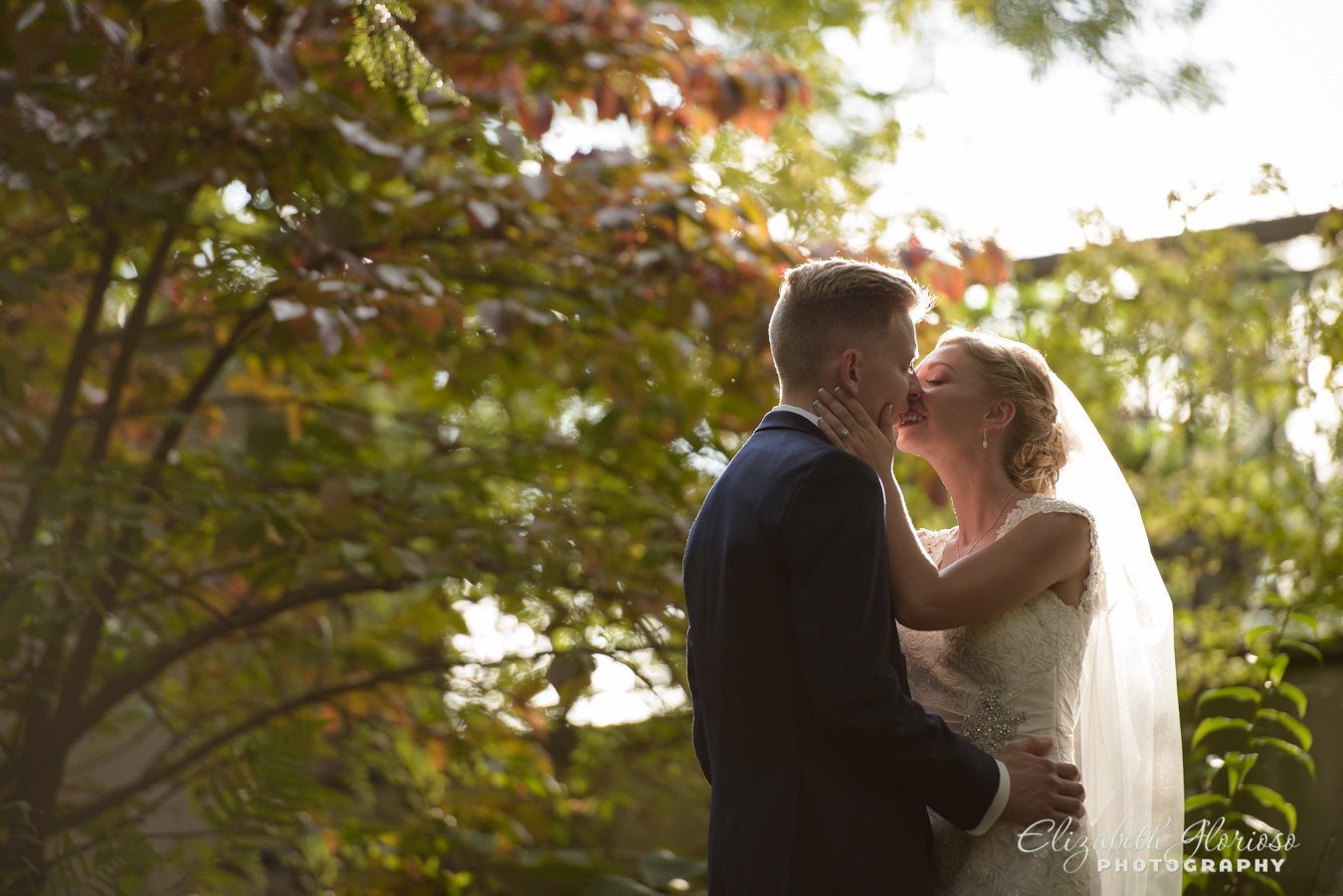 bride and groom kiss at Japanese Garden Cleveland Botanical Garden