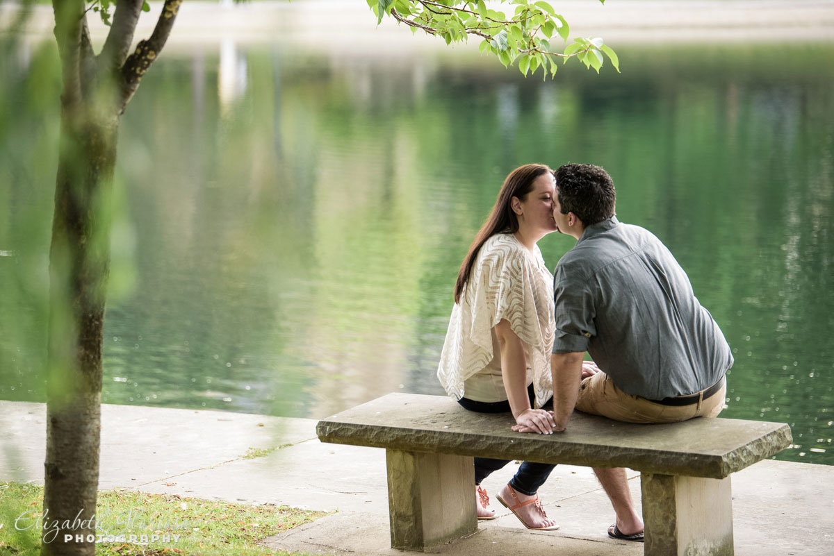 Couple kiss at the Cleveland Museum of Art lagoon in Cleveland Ohio